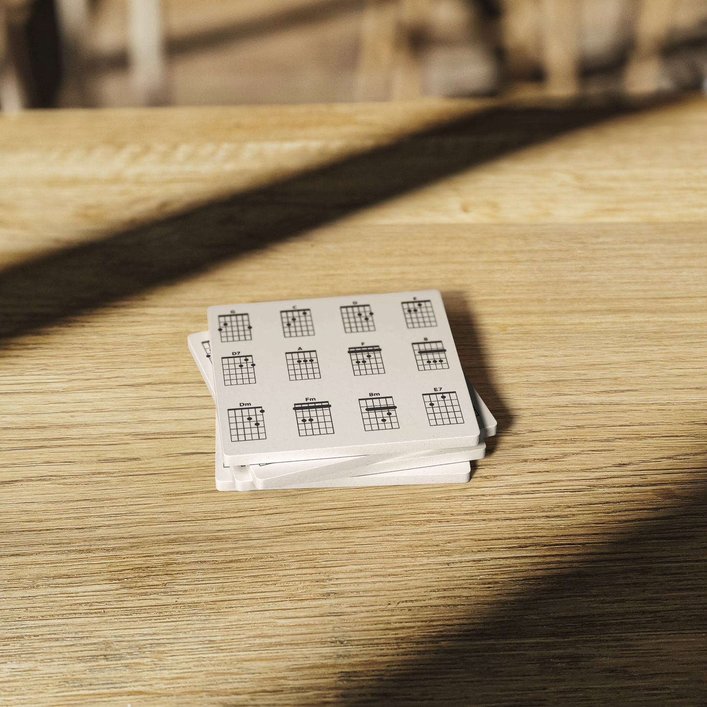 12_Guitar_Chords_Stone_Coaster_Set_-_Set_SquareStoneCoaster_WoodTable_AS_Mockup.png