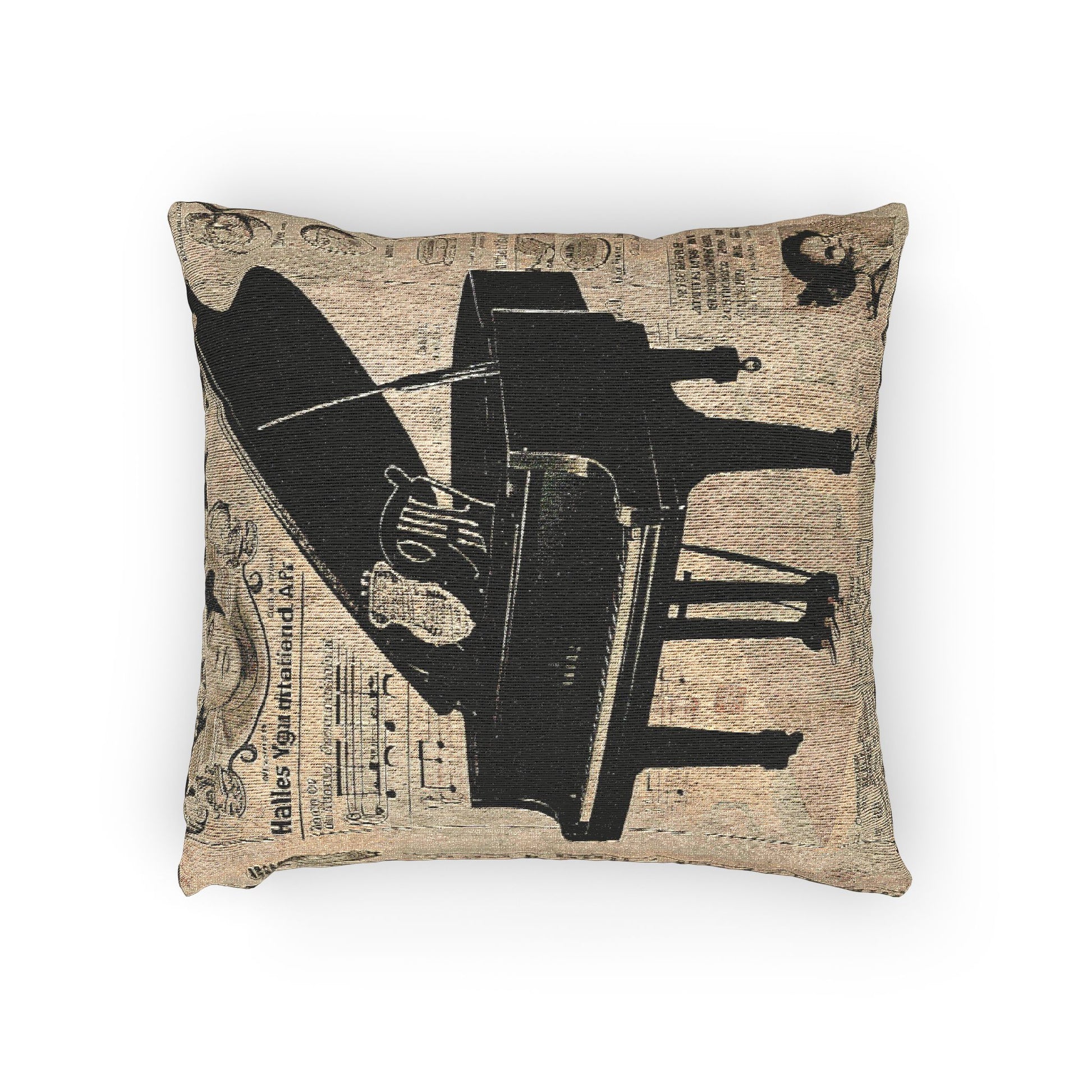 Woven pillow featuring a sepia grand piano engraving with antique sheet-music accents.